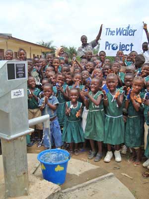 Students celebrate a new well in Sierra Leone